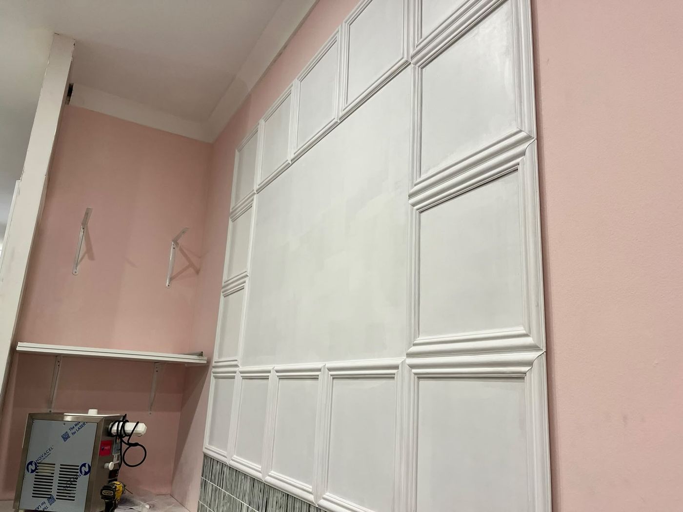 Panel wall fully undercoated in white